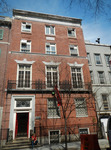 Color photograph, façade of China Institute in America office building in 2013, two stone lions at entrance