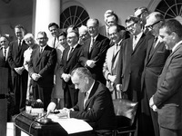 President Johnson signs the Wilderness Act on September 3, 1964.
