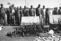 Fig. 57. A photograph by Ricardo Rangel of captured Renamo soldiers and weapons that Frelimo’s political and military officials presented privately to the press corps.