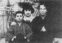 Black and white photo of Daisetz, Beatrice, and Alan.