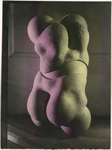 The hand-tinted black and white photograph from The Games of the Doll series (1938-1949) by Hans Bellmer represents two imbricated buttocks, themselves assembled around a ball joint, placed in an indoor setting against a wall.