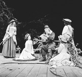 Fig. 4. Princess, Rosaline, Boyet (Alan Rickman), Maria, and Catherine in Act 4, Scene 1, of Barton’s 1978 RSC production of Love’s Labour’s Lost.