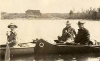 Biologist Aldo Leopold (center) accompanies his son Starker (left) on a canoe trip in the Quetico boundary waters in 1924.