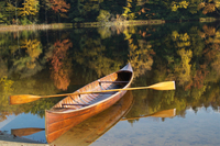 A restored William English canoe, model 21, which was listed as 16-feet long, 31 inches beam, and 12 inches deep.