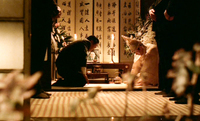 calligraphy on folding screen in a funeral room