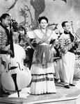 A black and white photograph of Toña la Negra appearing in traditional Veracruz dress in Humo en los ojos.