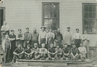 Workers at the Rushton Boat Shop in 1905. J. Henry Rushton stands at the lower left.