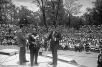 A black and white photograph of Toña la Negra in a 1970s concert appearance in the park.