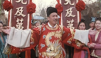 Calligraphy on two banners in a parade where a government official comes home