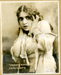 Black-and-white photograph of actress Sonia Alomis clutching her head.