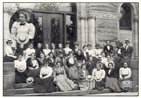 Group photo of well-dressed women on library steps. Many wear straw boater hats. Sears, in the front row, holds hers. Inset oval portrait at top. WWLW logo in lower corner.
