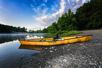 Wenonah continually experimented with new models, including this solo canoe called the Vagabond, seen on the shore of Abel Lake in Virginia. Solo canoes became popular for wilderness trippers and day paddlers alike.