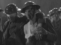 Figure 1.4. The Marching Wounded. Film still of wounded soldiers from the sequence accompanying the song “Remember My Forgotten Man,” in Gold Diggers of 1933 (Warner Brothers)