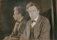 Photograph of Meyerhold taken in front of a mirror so that both his face and profile can be seen simultaneously.