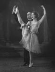 Dressed in a tuxedo, Ropes appears in a high-­kicking dance pose with Marian Hamilton, wearing a sleeveless dress and baring her leg.