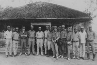 Fig. 35. Photograph of the press photographer Ricardo Rangel dressed in military fatigues meeting the president and other officials of Frelimo in the liberated zones during the transition period.