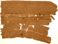 Large papyrus containing the address of an Arabic letter and one word in Greek.