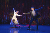 Photograph of the actress playing Hillary Clinton and her love interest dancing side by side in choreographic poses that recall Fred Astaire and Ginger Rogers.