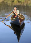 Pam Wedd, owner of Bearwood Canoe Company near Parry Sound, Ontario, paddles a restored Gerrish canoe.