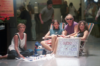 Fig. 4. A moment in a disruption of a bank when a family deployed beach chairs to protest the bank's blockade of their saving account.