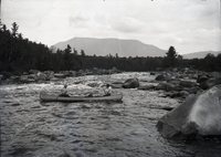 A black-and-white photograph of Pockwockamus Falls on the West Branch of the Penobscot River, 1915.