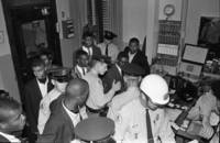 Civil rights activists are booked into Raleigh jail cells after a protest march.