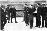Ford Security men (LEFT) and UAW men at the Rouge just before the Battle of the Overpass. Walter Reuther and Richard T. Frankensteen are second and third from the right.