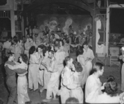 Wacs and GIs at a dance sponsored by the 43rd Infantry Division in the Philippines.”
