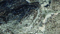 Overhead view of Kratul i Madh displaying 8 outlined squares. The military trenches located in square 2, the East Wall located next to square 4, the Gate located next to square 6, and Tower located near square 8.