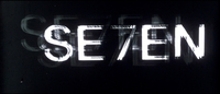 The title frame from _Seven's_ famous title sequence, which uses both scratching and digital manipulation.