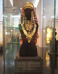 Traditional gold necklaces and colorful Mizrahi veil on female torso mannequin in the Judaica and Jewish Ethnography Wing, The Israel Museum.