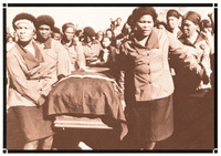 Photos shows a crowd of mourners at Mxenge's funeral. Six women carry her casket, all dressed in matching skirts, jackets with wide lapels and cuffs, and berets.