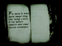 Blurry sepia-toned image of a book with old-looking font on it that reads "For months he sowed panicke amongst village folke through a series of foul murders committed under almost identical circumstances…"