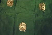 This Paturu (near Nellore) sari is distintive for its use of embroidered patterns throughout the body of the sari, and for its relatively unadorned pallu.