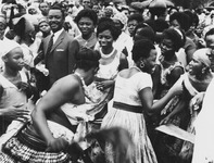 Fig. 7: Photograph of Anna Foncha surrounded by women dancing a local West Cameroon dance.