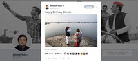 A tweet by Akhilesh Yadav reads “Happy Birthday Dimple.” An accompanying photo shows two people, one man and one woman, standing on a small patch of sand next to a large body of water. The woman appears to be pointing at something, and the man looks in the same direction through binoculars.