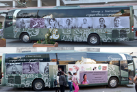 Two images of a gray-­and-­white bus. In the top image the side of the bus is covered with photographs of mothers. In the bottom image we see people walk in front of the bus, while another side is shown with photographs of their disappeared children.