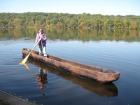 Alice Zalonis Brylawski stands in a dugout canoe at a Wooden Canoe Heritage Association MiniAssembly at Gifford Pinchot State Park in Pennsylvania in 2012.