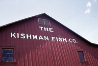 A color photograph of the exterior of Kishman Fish Co. building.