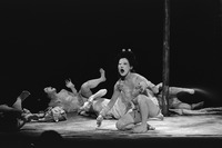 Figure 14.1. Five women, in pasty white powder and rice paper, wearing old geisha wigs, squat in various positions, grimacing. One woman in front, grimaces, her mouth wide open.