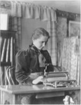 Helen Keller at her typewriter in her Cambridge, Massachusetts, home while a student at Radcliffe, 1900.