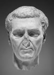 A marble portrait head of the Roman emperor Nerva that was recut from a visage of Domitian.