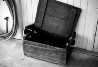 A photograph of a handmade wooden fish box.