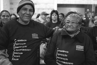 Photograph of Dona Hilda and her son dressed in Codespa’s T-­Shirt.