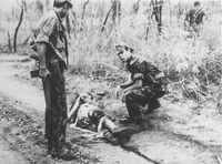 Fig. 5. Portuguese troops in Northern Mozambique attending to an injured combatant.
