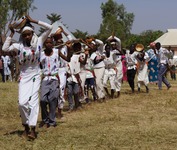 Several students, wearing Fulani-style garments, presenting a dance skit at school graduation.