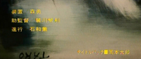 Yellow calligraphy is superimposed on a close-up of a painting.