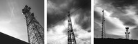 Three black and white photos of tall radio towers in out of the way places with microwave dishes mounted on them