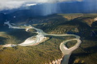 A color photograph of an aerial view of the Nahanni River.