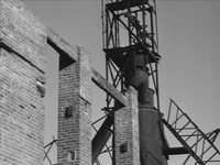 Film still showing Postwar ruins.